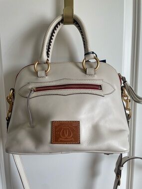 Dooney & Bourke Cream Leather Satchel with Brown Patch and Red Zip Accent